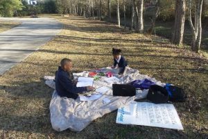 Image of kids doing homework outside 2 - NJ Blog